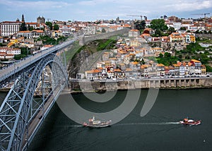Spring in Portugal. Duoro river and view of the rooftops of the old city of Porto. Ponte LuÃ­s I. Vila Nova de Gaia bridge.