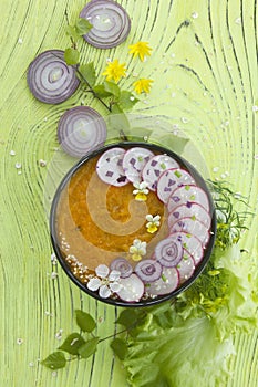 Spring pumpkin soup with flowers