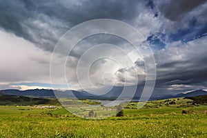 Spring rain and storm in mountains. Green spring hills of Slovak