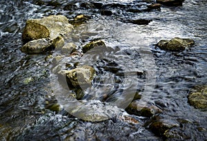 Spring river with large stones