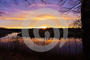 Spring. river. sunrise. sunset. Dawn over the river photographed in early spring