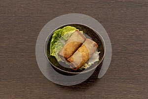 Spring roll made from a paste filled with different julienned vegetables