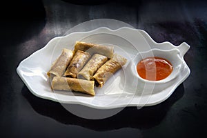 Spring rolls (Dim sum or Loempia), cuisine on the table.