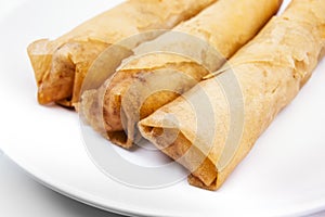 Spring rolls (Dim sum or Loempia), cuisine on white background.