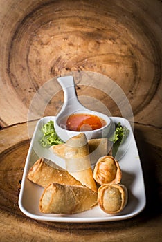 Spring rolls served with a sweet chili dip
