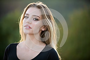 Spring romantic casual woman portrait. Beautiful girl outdoor, close up beauty young female face.