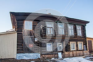 Spring rural landscape with wooden house