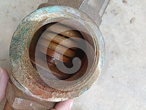 Spring and safety valve rusty inside industry and factory design engineering machine parts of water pipe line