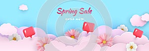 Spring sale banner with paper flowers on blue background. Spring flowers in pink clouds. Vector