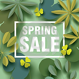 Spring sale card with different floral elements in shades of green.