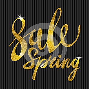 Spring Sale. Gold inscription paint. glitz, glamor, light, shine, discounts photo