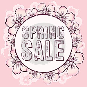 Spring sale graphic with delicate pink flowers