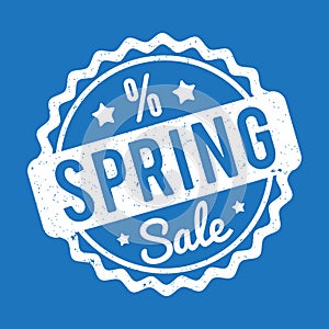 Spring Sale rubber stamp white on a blue background.