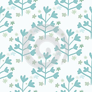 Spring seamless pattern with blue floral silhouettes on light yellow background. Simple doodle backdrop