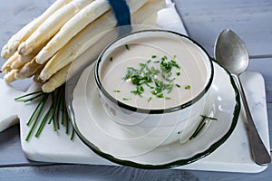 Spring season - white asparagus soup with fresh green chives re