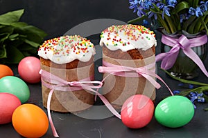 Spring still life of Easter cakes, painted eggs and forest snowdrops