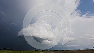 Spring Storms Build Above a Peaceful Country Road Time Lapse.