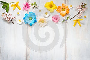 Spring summer flowers on wooden retro planks abstract floral background