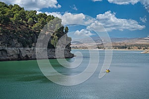 Spring summer landscape blue sky clouds river pedal boat green trees