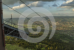 Spring sunset in evening with yellow sun on Jested hill Liberec CZ 05 03 2024