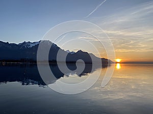 Spring sunset over the eastern shore of Lake Geneva lac de GenÃ¨ve, lac LÃ©man or Genfersee, Villeneuve - Switzerland / Suisse