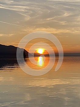 Spring sunset over the eastern shore of Lake Geneva lac de GenÃ¨ve, lac LÃ©man or Genfersee, Villeneuve - Switzerland / Suisse