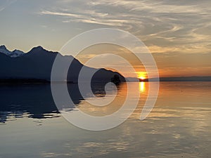 Spring sunset over the eastern shore of Lake Geneva lac de GenÃ¨ve, lac LÃ©man or Genfersee, Villeneuve - Switzerland / Suisse