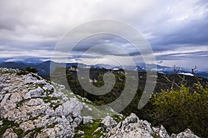 Spring sunset in Santuari Mare De Deu Del Mont peak, La Garrotxa, Spain