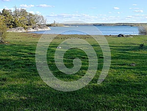 Spring in Sweden Smaland lake grass field