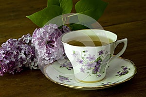 Spring Tea Cup and Lilacs photo