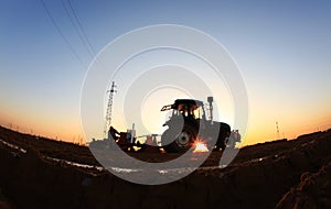 The tractor in farmland farming