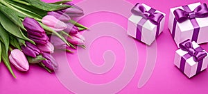Spring tulips and gifts with satin bows