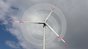 Spring view on alternative energy wind mills in a windpark
