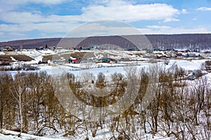 Spring view from the highway to the Siberian village of Ust-Khmelevka