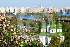 Vydubychi Monastery with lilac blossom in Kyiv, Ukraine