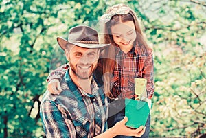 Spring village country. father and daughter on ranch. little girl and happy man dad. earth day. new life. ecology