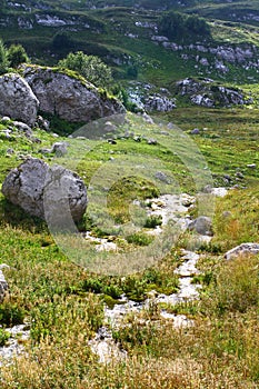 Spring water mountain river and the pretty petrous creek on North Caucasus. mountain natural landscape photo