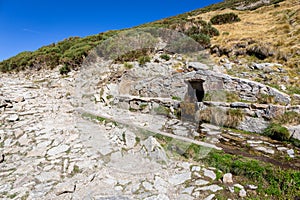 Spring water tap in Sierra de Gredos mountains, Spain photo