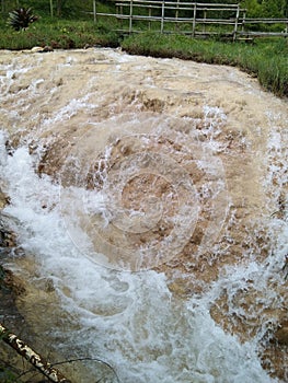 Spring waterfall in the creater of the mount lembang