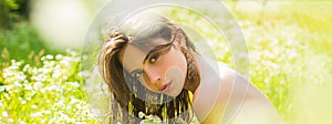 Spring woman face for banner. Sensual Spring Young Woman Outdoors Enjoying Nature. Smiling Young Woman in Green Grass