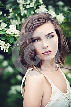 Spring Woman with Permed Hair and Makeup Outdoor photo