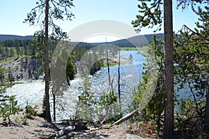 Spring in Yellowstone: Yellowstone River and Steam Plumes from East Caldron Seen From Near Sulphur Caldron Along Grand Loop Road