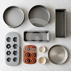 Springform pans, a rectangular loaf pan, and a fluted tart pan