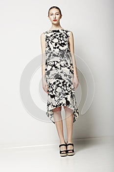 Springtime Collection. Elegant Slender Woman in Stylish Dress. Trendy Fashion Model