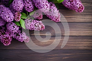 Springtime lilac bouquet atop wooden plank background, blooming with purple elegance.