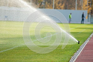 Sprinkler watering football field