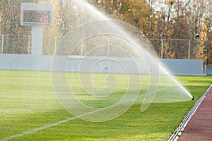 Sprinkler watering football field