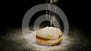 Sprinkling powdered sugar donut topped with a delicious glaze