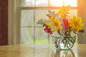 Sprint flowers assorted in vase with spring weather outside and