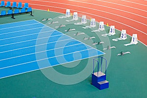 Sprint start line with blocks on track and field